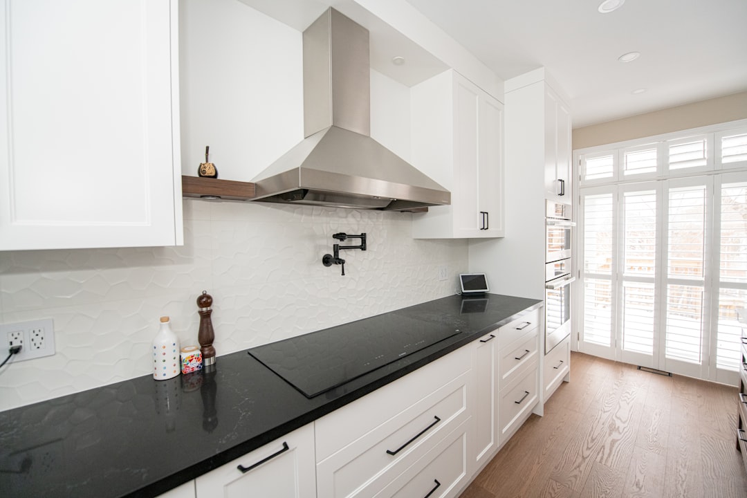 Modern kitchen counters cabinets and backsplash for surface cleaning